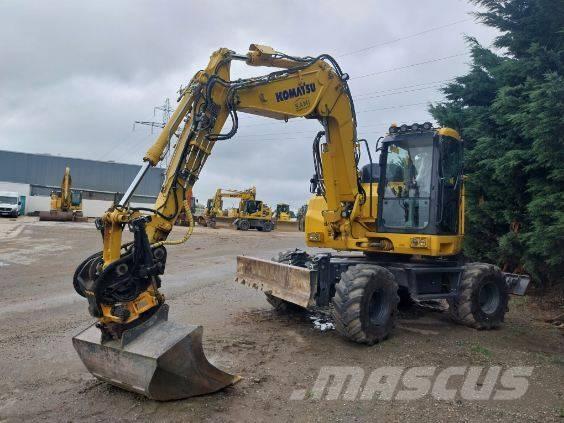 Komatsu PW138MR-11 حفارات بعجل