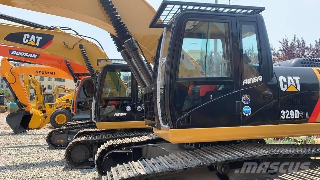 CAT 329 D L حفارات زحافة