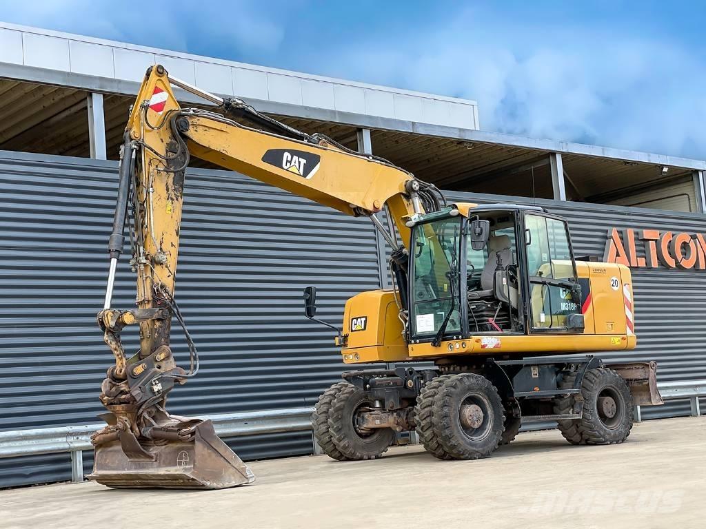CAT M318F حفارات بعجل