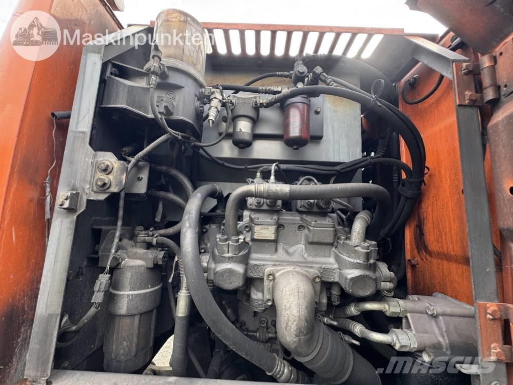 Hitachi ZX 140 W-3 حفارات بعجل