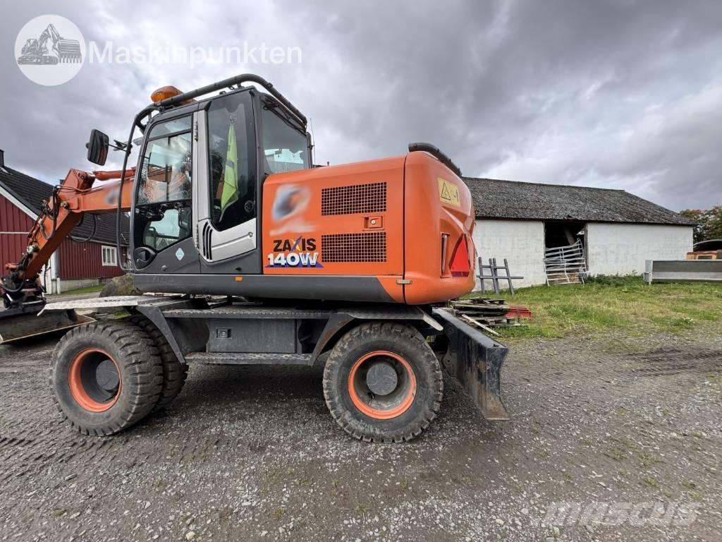 Hitachi ZX 140 W-3 حفارات بعجل