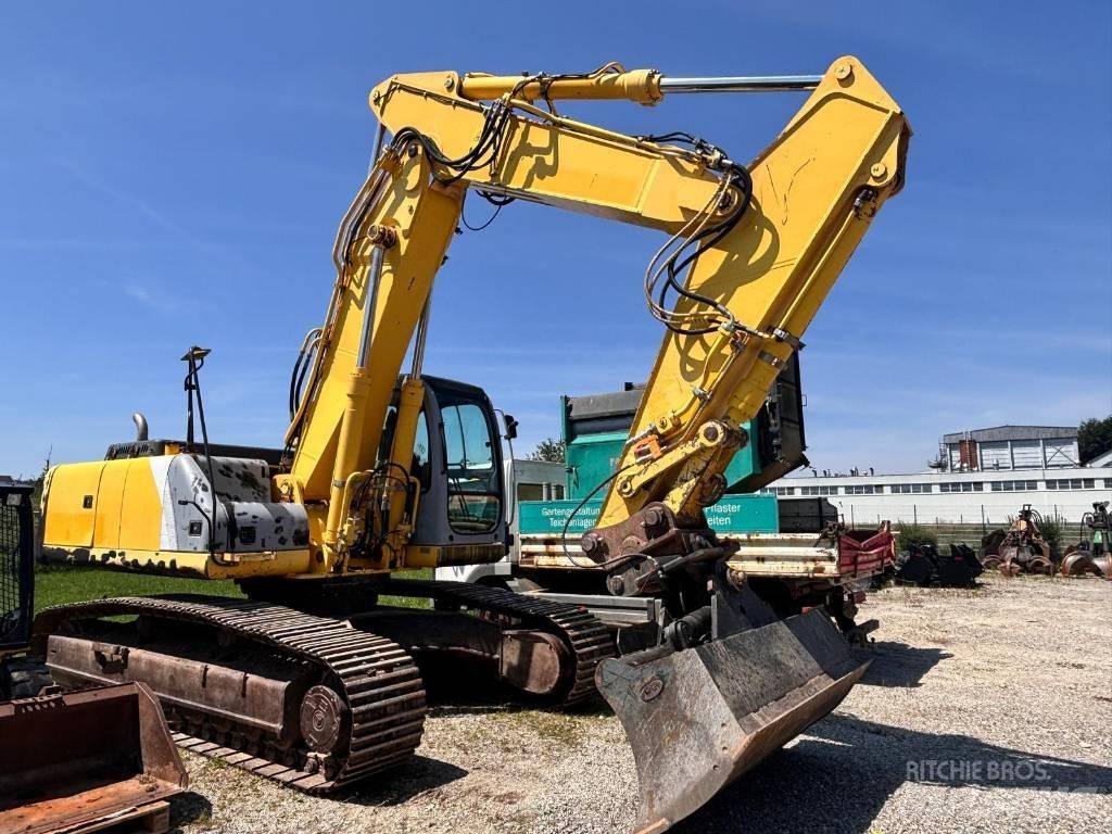 New Holland E 305 حفارات زحافة