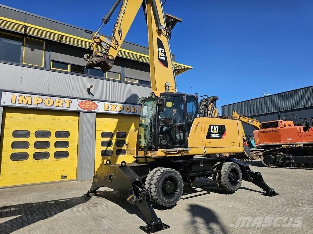 CAT MH 3022 حفارات بعجل