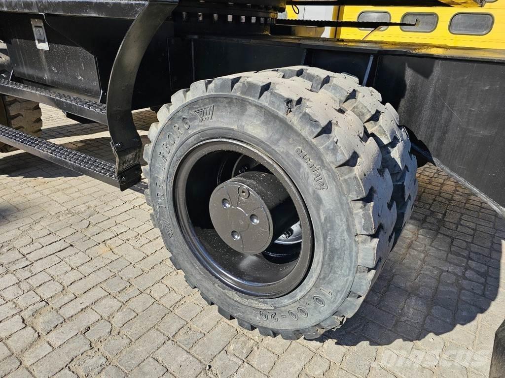 CAT MH 3022 حفارات بعجل