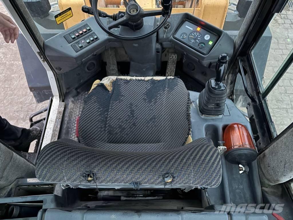 Liebherr L 522 لوادر بعجل