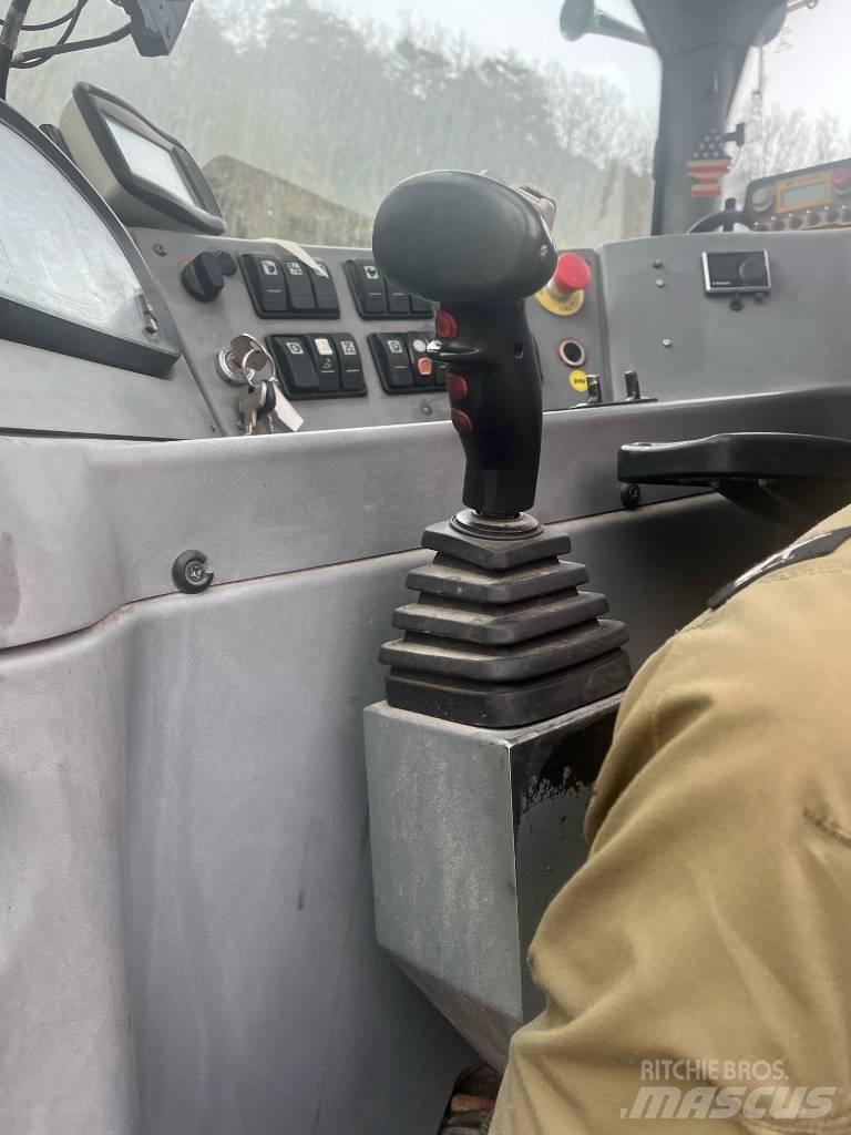 Menzi Muck M545A حفارات بعجل