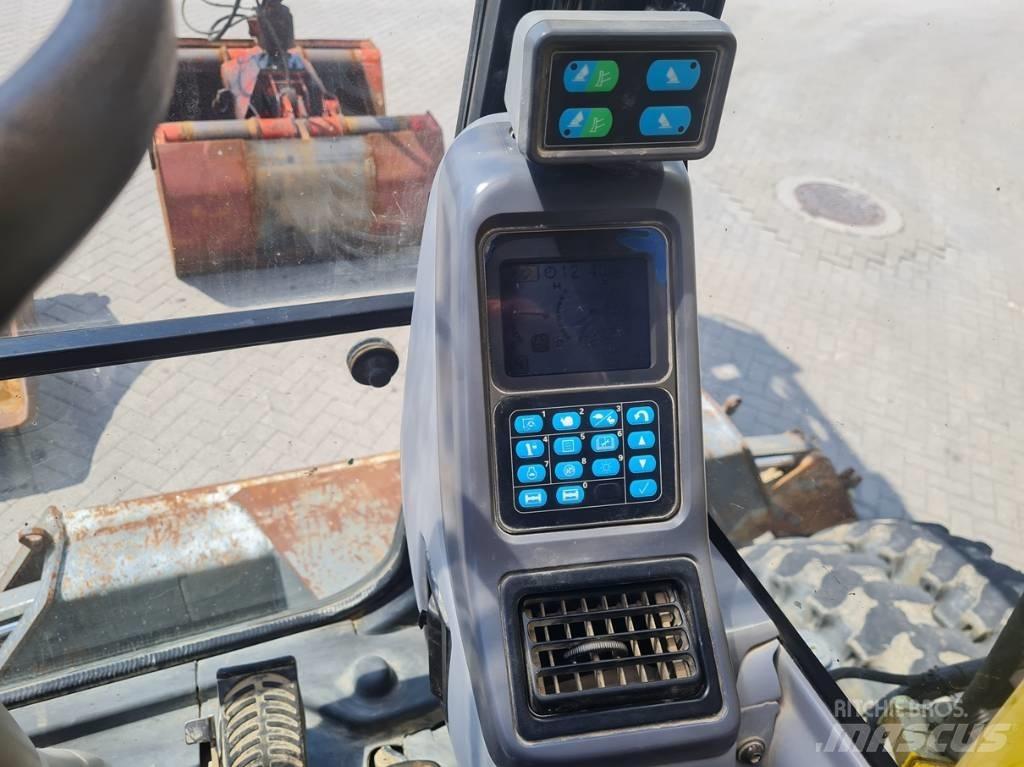Komatsu PW 140-7 حفارات بعجل