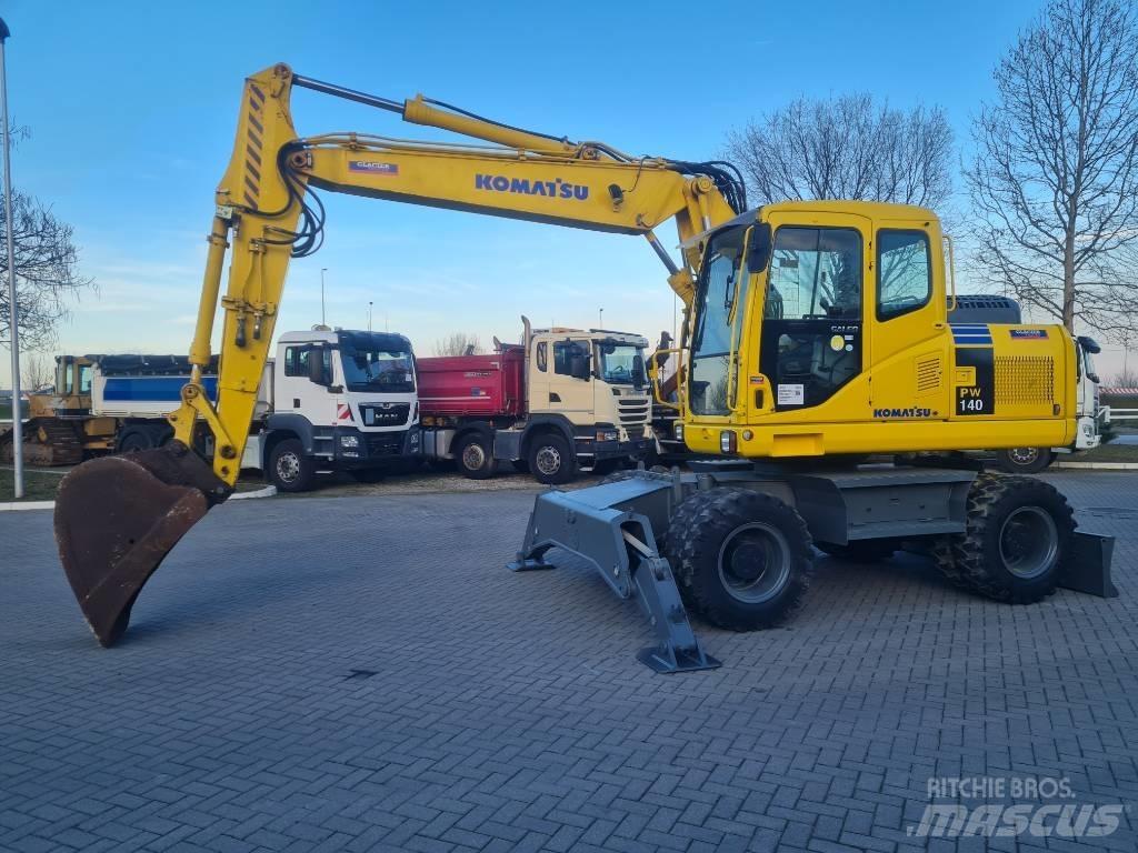 Komatsu PW 140-7 حفارات بعجل