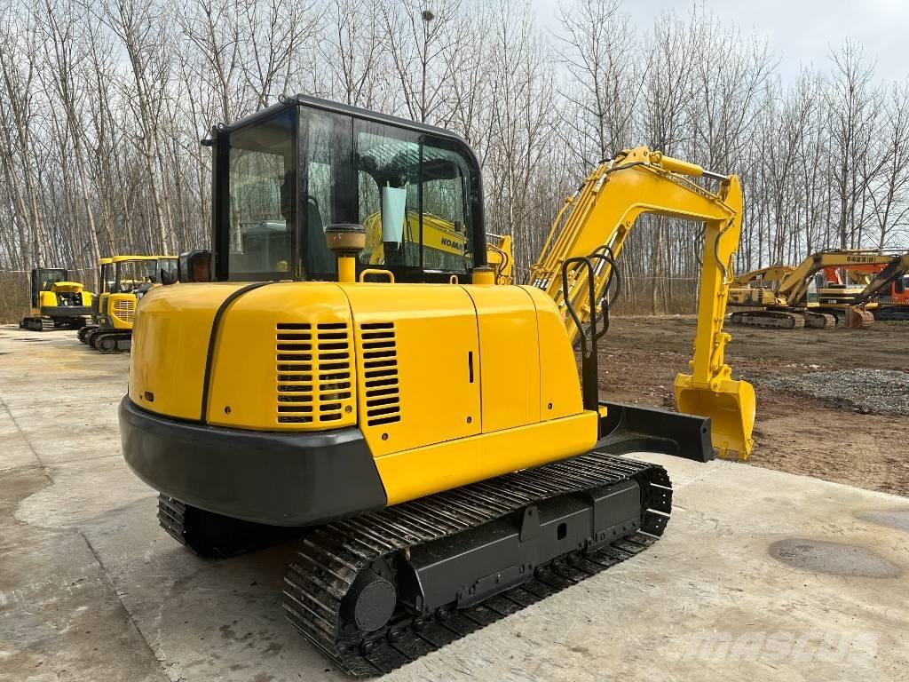 Komatsu PC56-7 حفارات زحافة