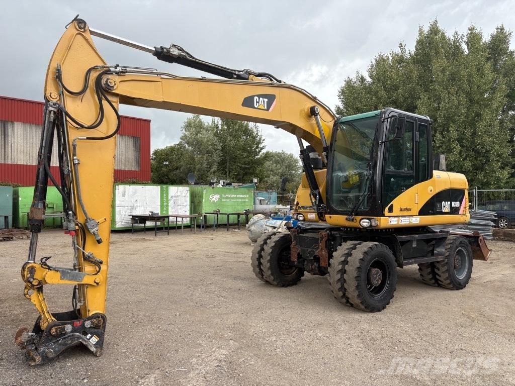CAT M 313 D Mono حفارات بعجل