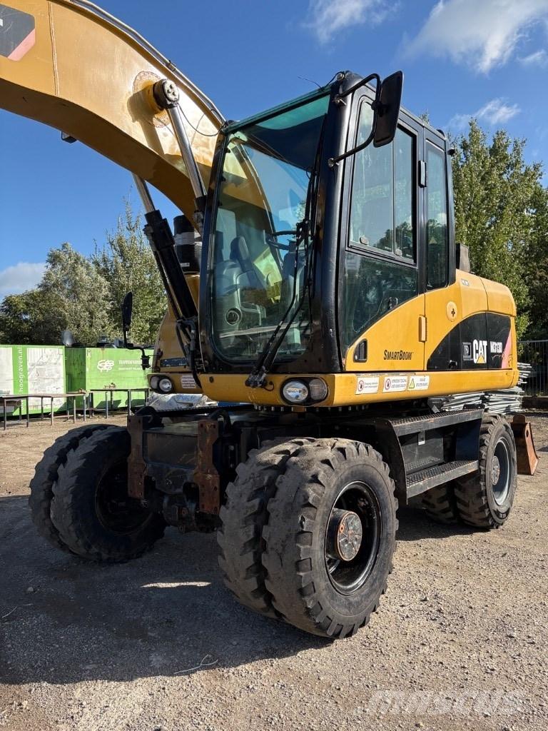 CAT M 313 D Mono حفارات بعجل