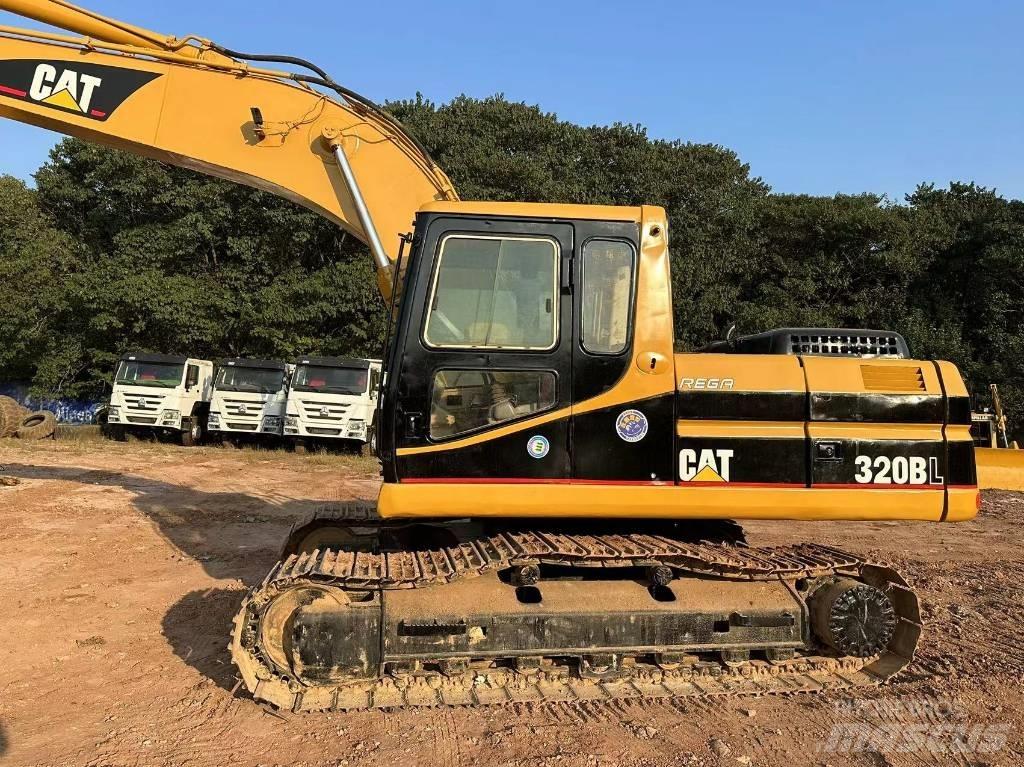 CAT 320 B L حفارات زحافة