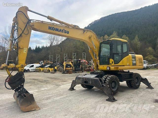 Komatsu PW 180 حفارات بعجل