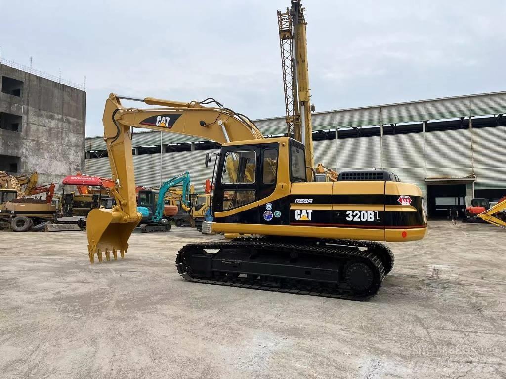 CAT 320 B L حفارات زحافة
