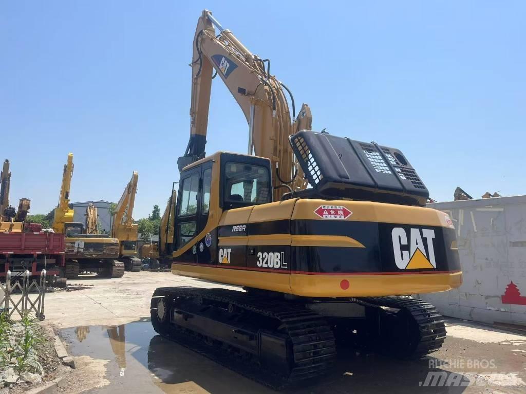 CAT 320 B L حفارات زحافة