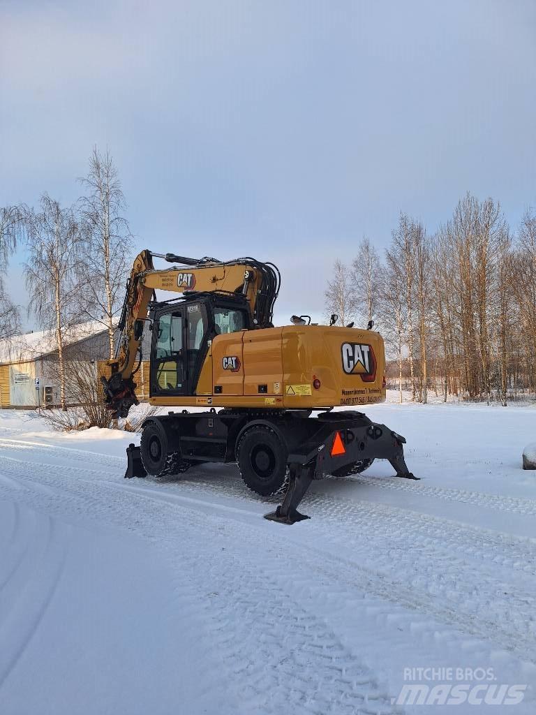 CAT M 318 حفارات بعجل