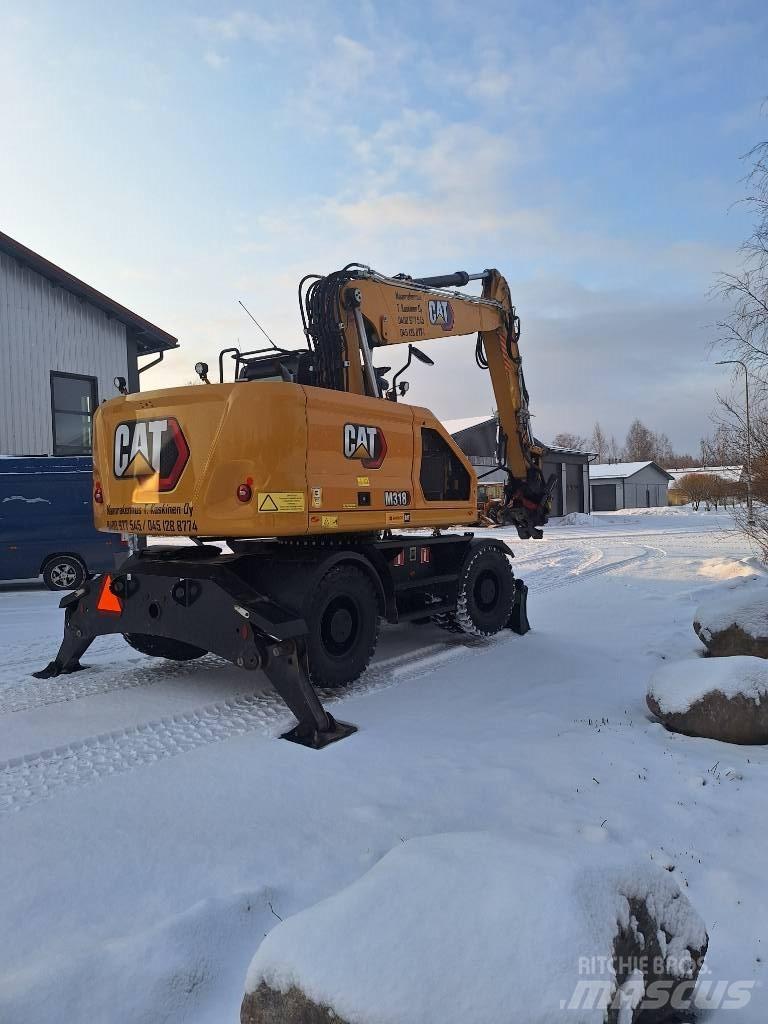 CAT M 318 حفارات بعجل