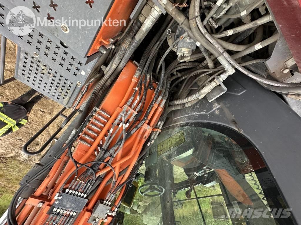 Doosan DX 170 W حفارات بعجل