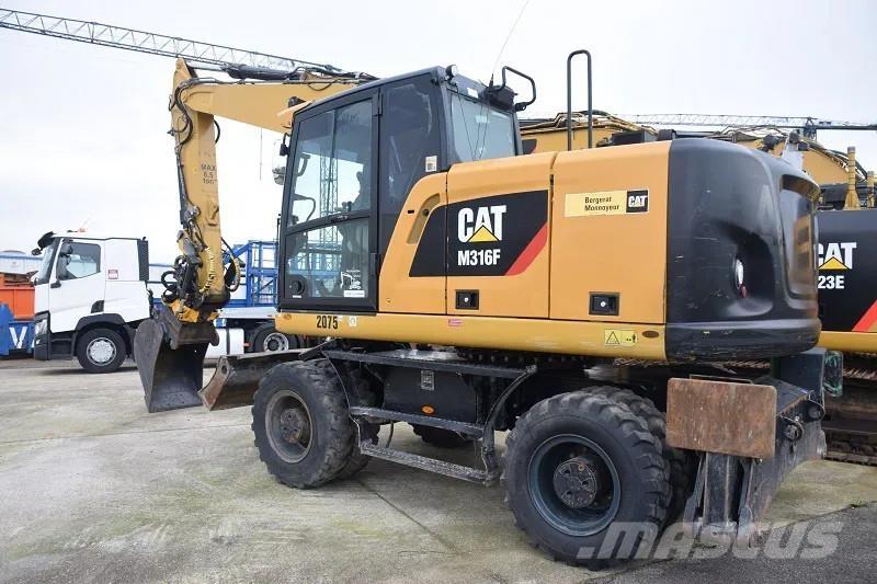 CAT M316F حفارات بعجل