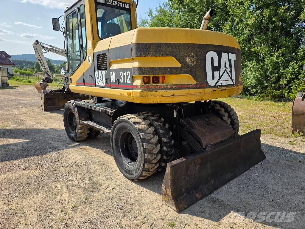 CAT 312 M حفارات بعجل