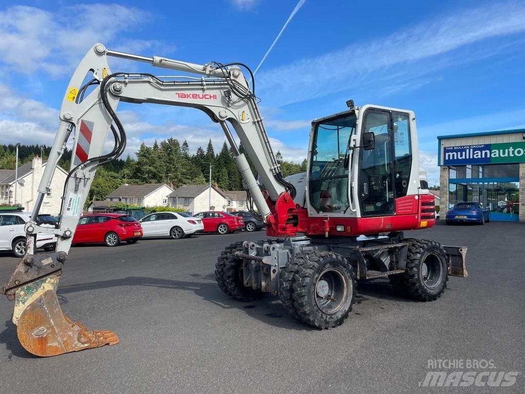 Takeuchi TB295W حفارات بعجل