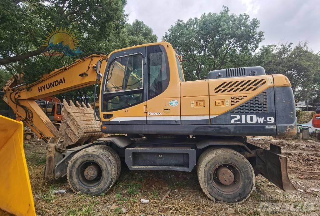 Hyundai R210W-9 حفارات بعجل