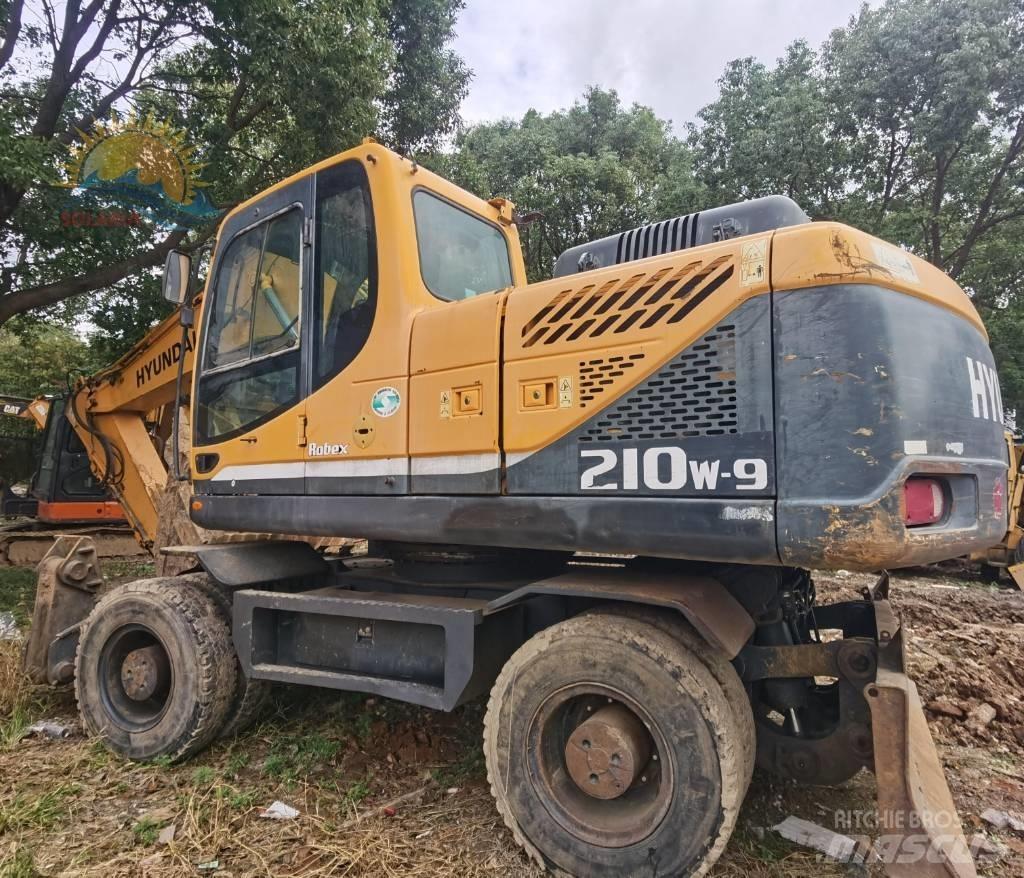 Hyundai R210W-9 حفارات بعجل