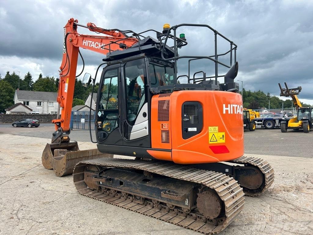 Hitachi ZX135 US-6 حفارات زحافة