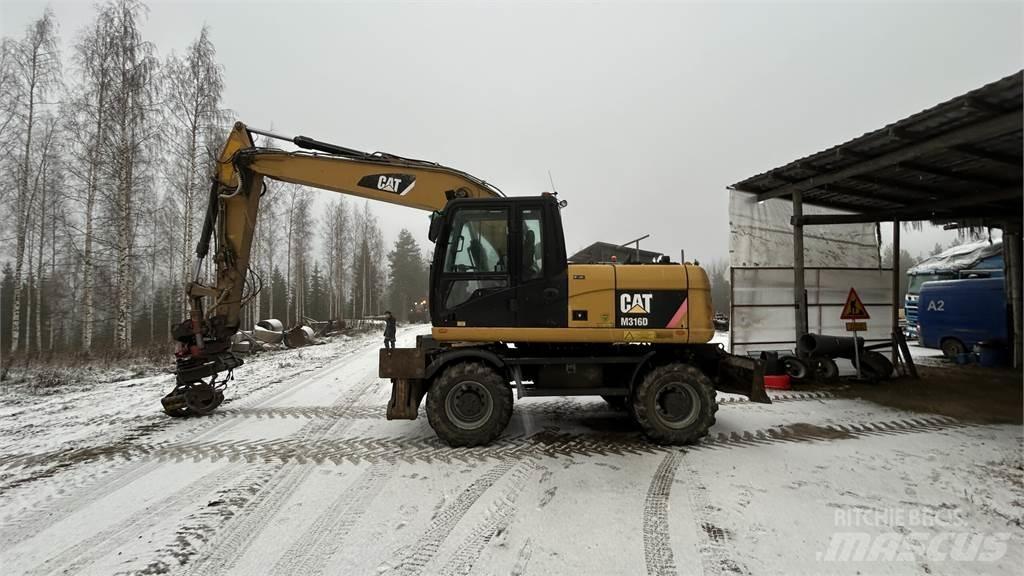 CAT 316 D حفارات بعجل
