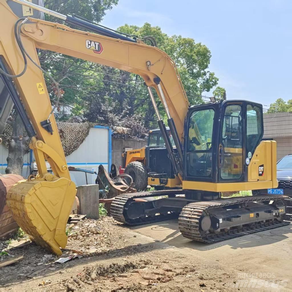 CAT 310 حفارات زحافة