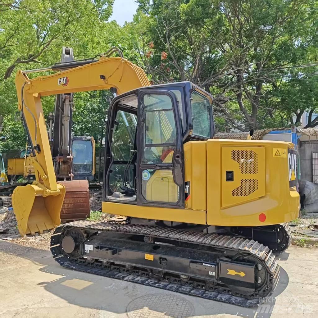 CAT 310 حفارات زحافة