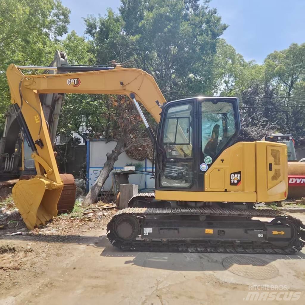 CAT 310 حفارات زحافة