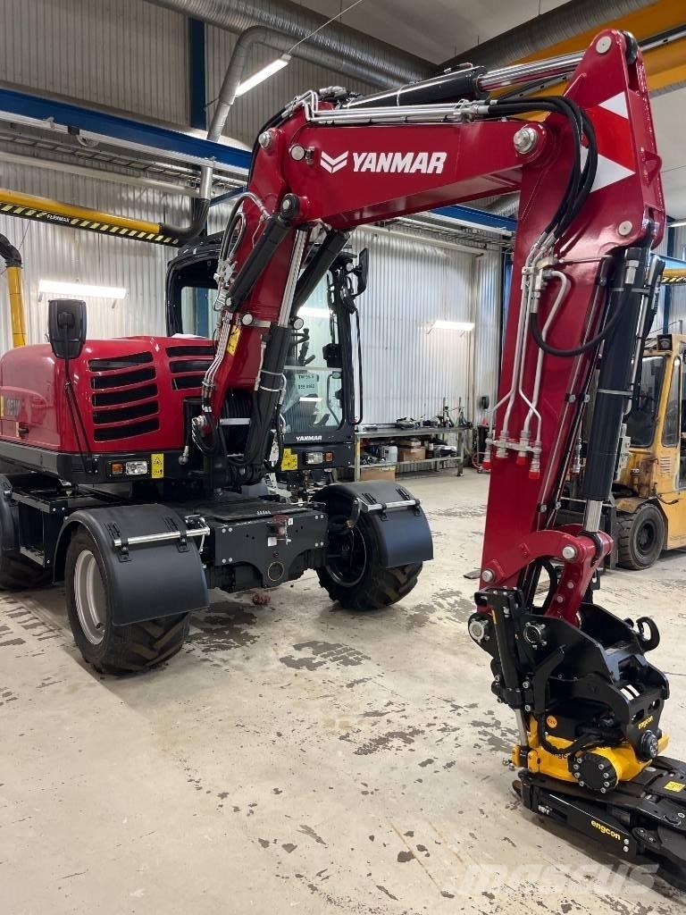 Yanmar B 95 W حفارات بعجل