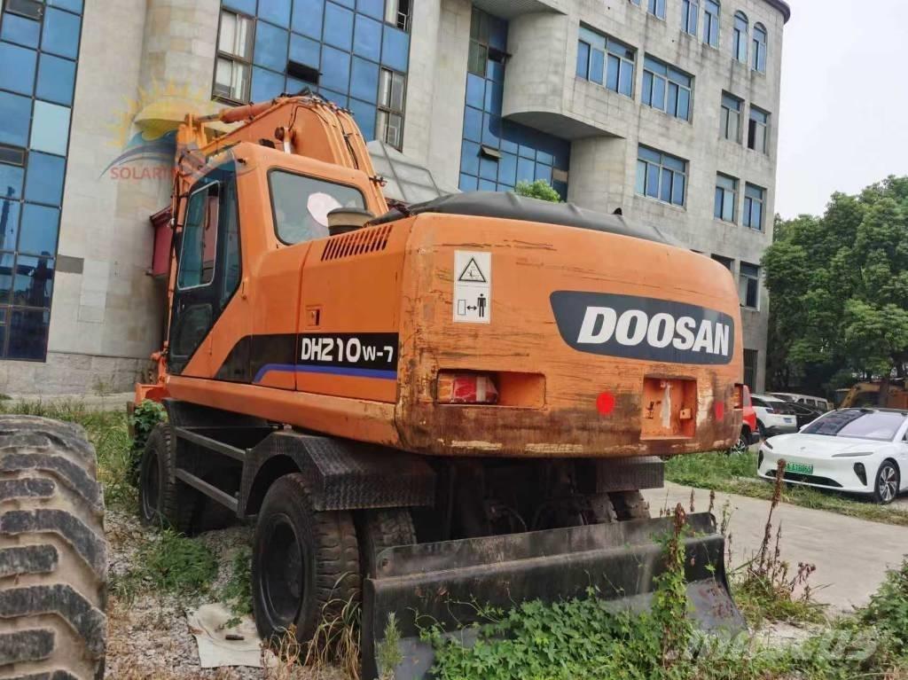 Doosan DH 210 W-7 حفارات بعجل
