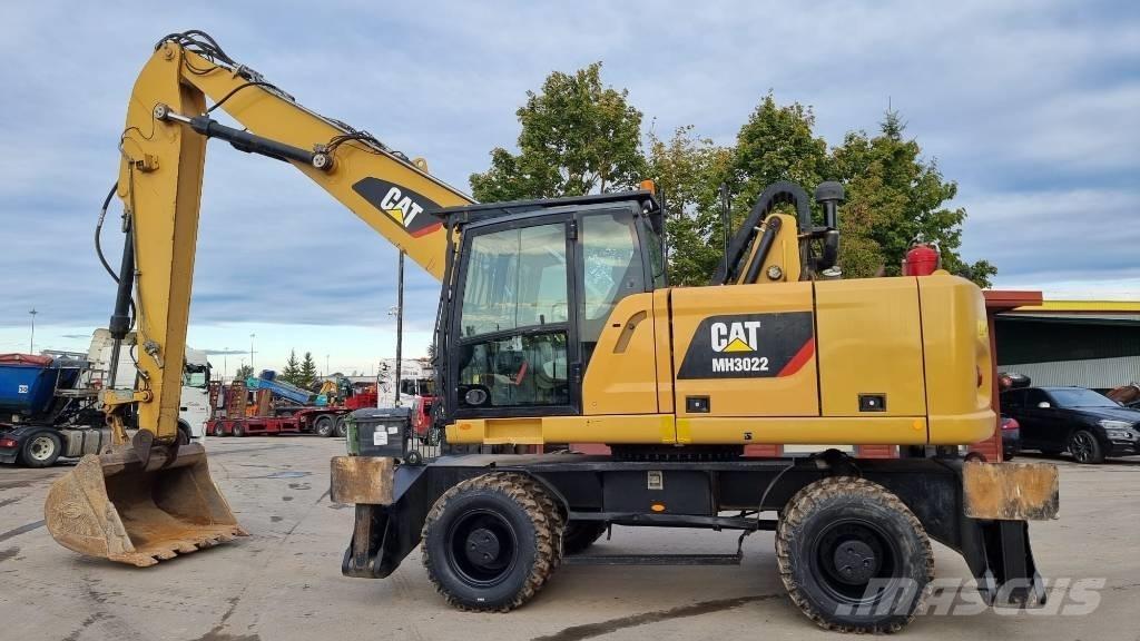 CAT MH 3022 مناولات المخلفات / مناولات صناعية