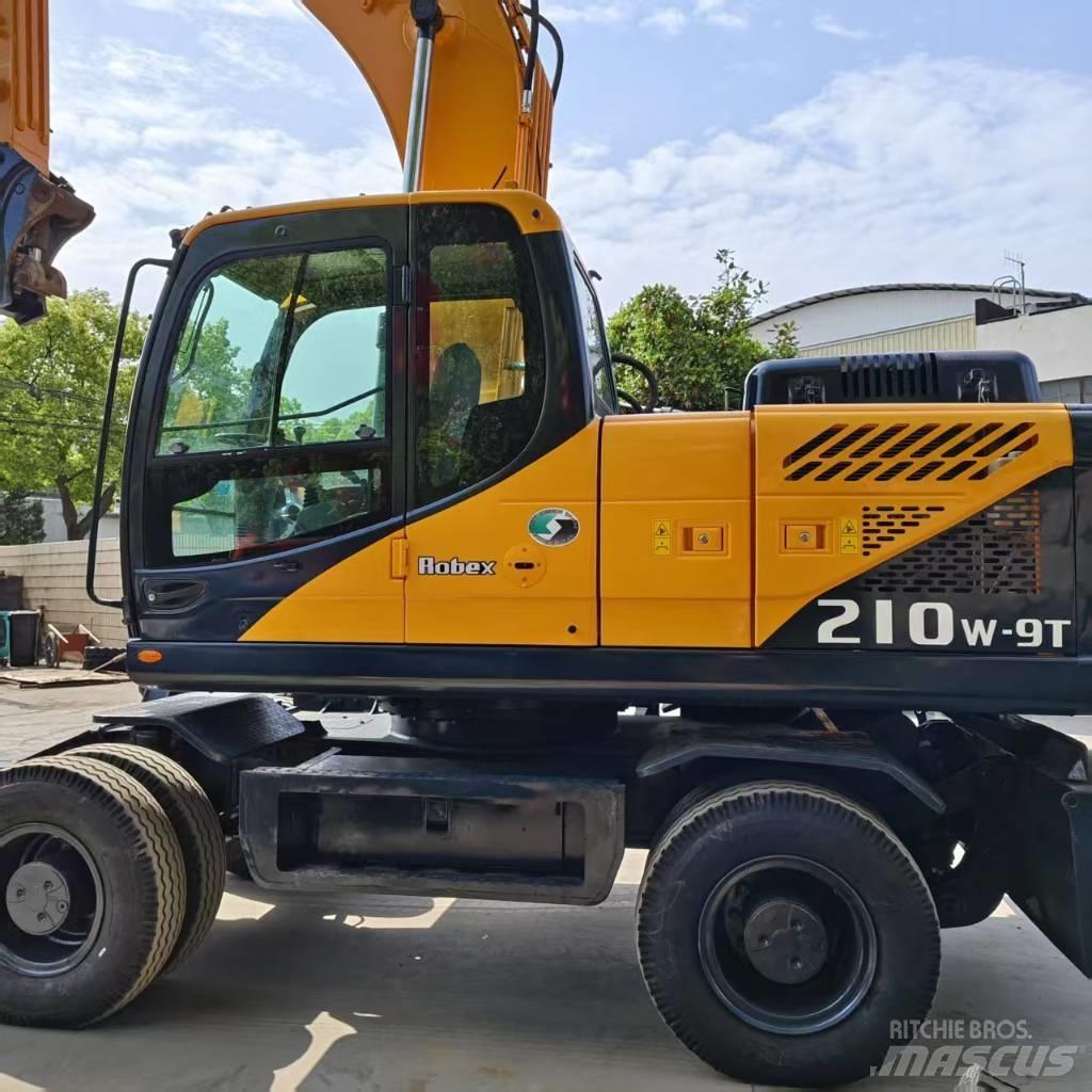 Hyundai 210w-9 حفارات بعجل
