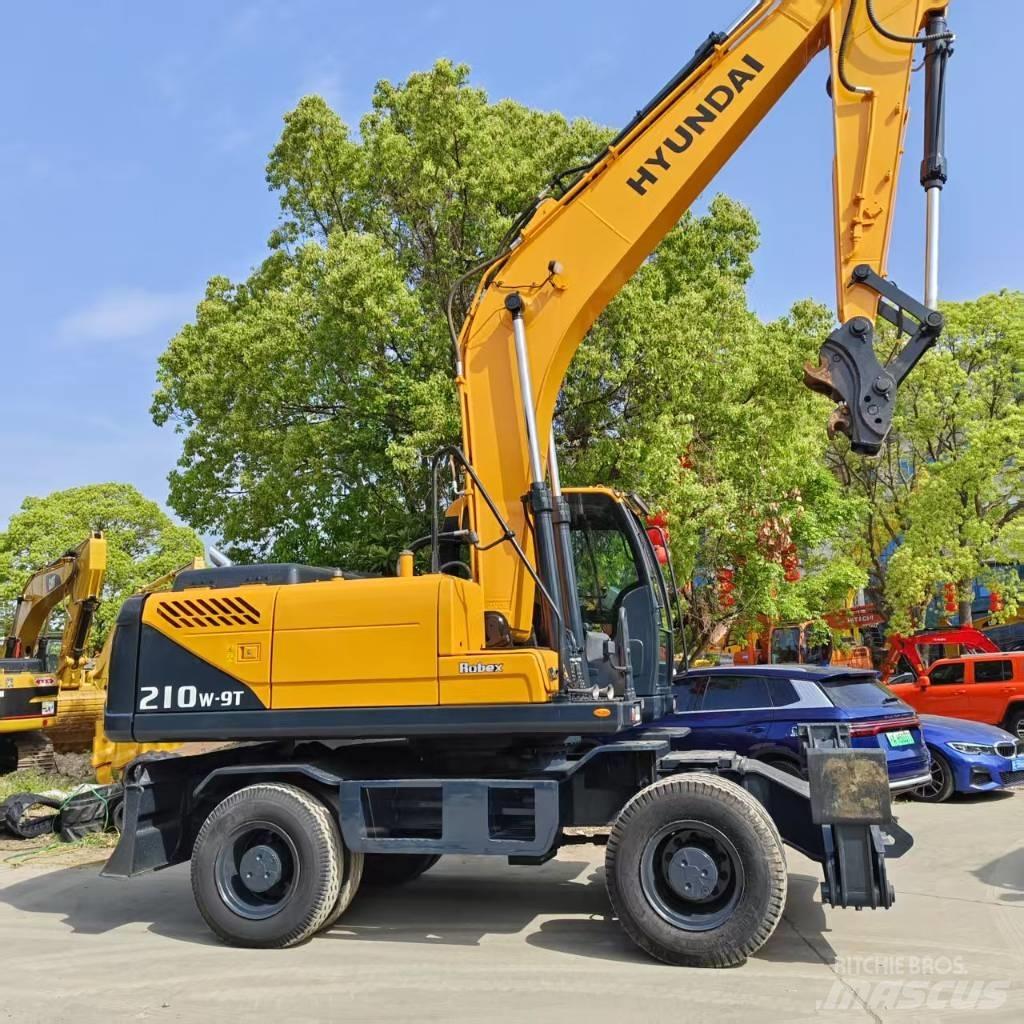 Hyundai 210w-9 حفارات بعجل