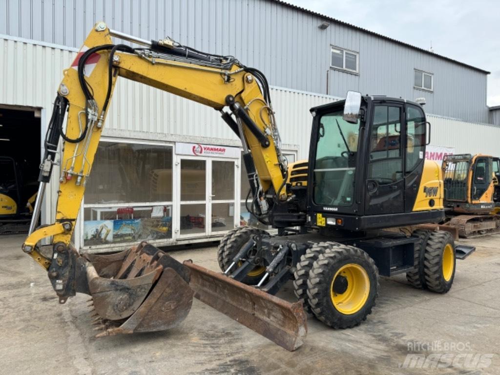 Yanmar B95W (40744) حفارات بعجل