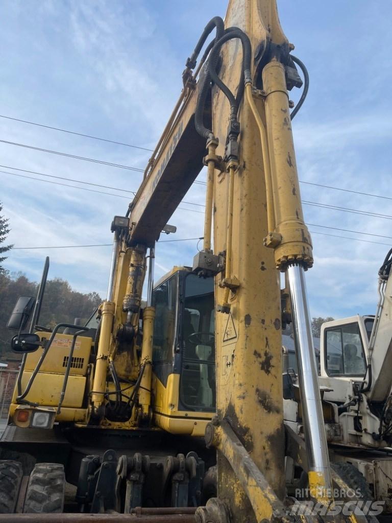 Komatsu PW 130-7K حفارات بعجل
