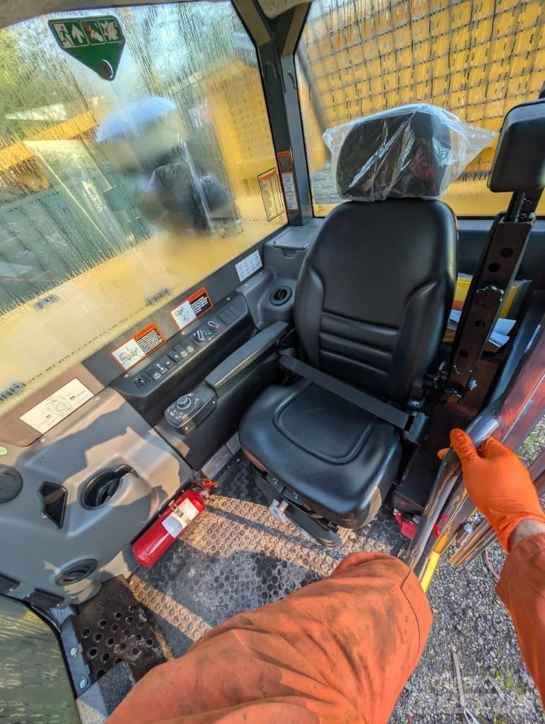 Bell TC7A عربات نقل قلابة مجنزرة