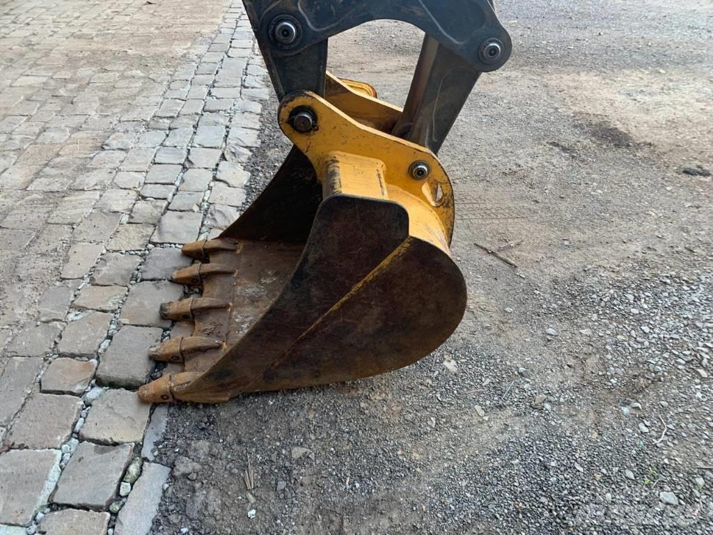 John Deere 310 L لوادر ذات جرافات عكسية