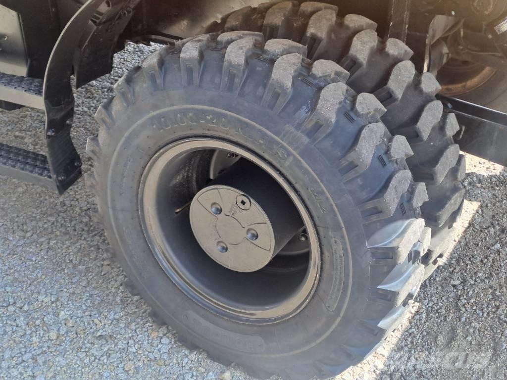 CAT M318F حفارات بعجل
