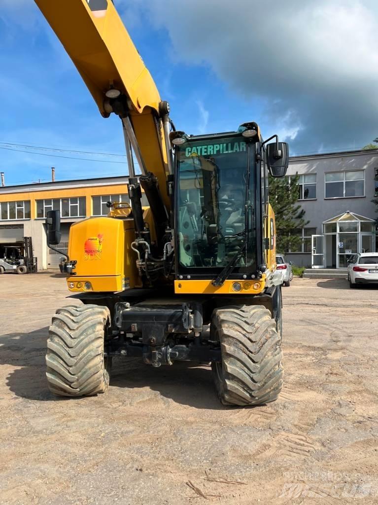 CAT M 314 F حفارات بعجل