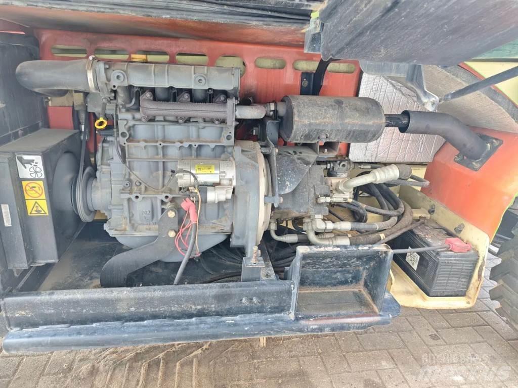 JLG 4394 RT رافعات مقصية الشكل