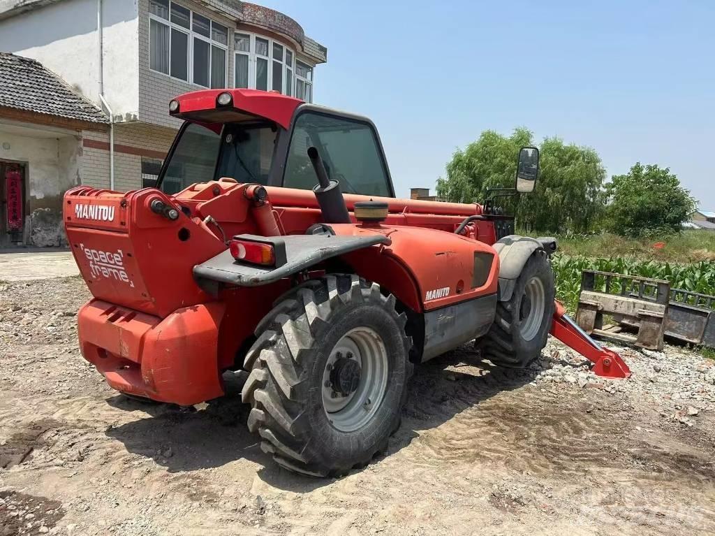 Manitou MT 1740 SL T لوادر انزلاقية التوجيه