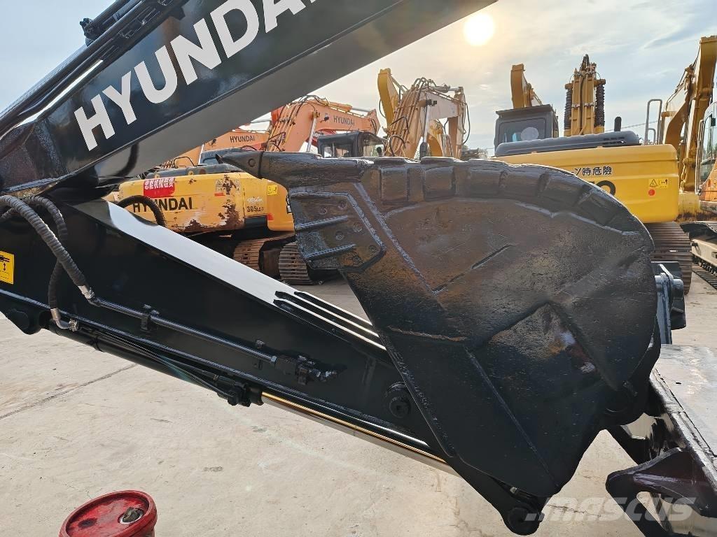 Hyundai R210W-9 حفارات بعجل
