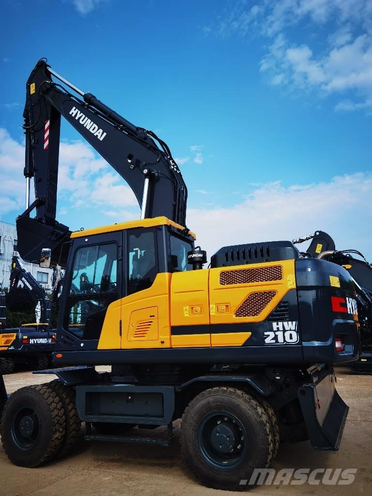 Hyundai 210W-9 حفارات بعجل