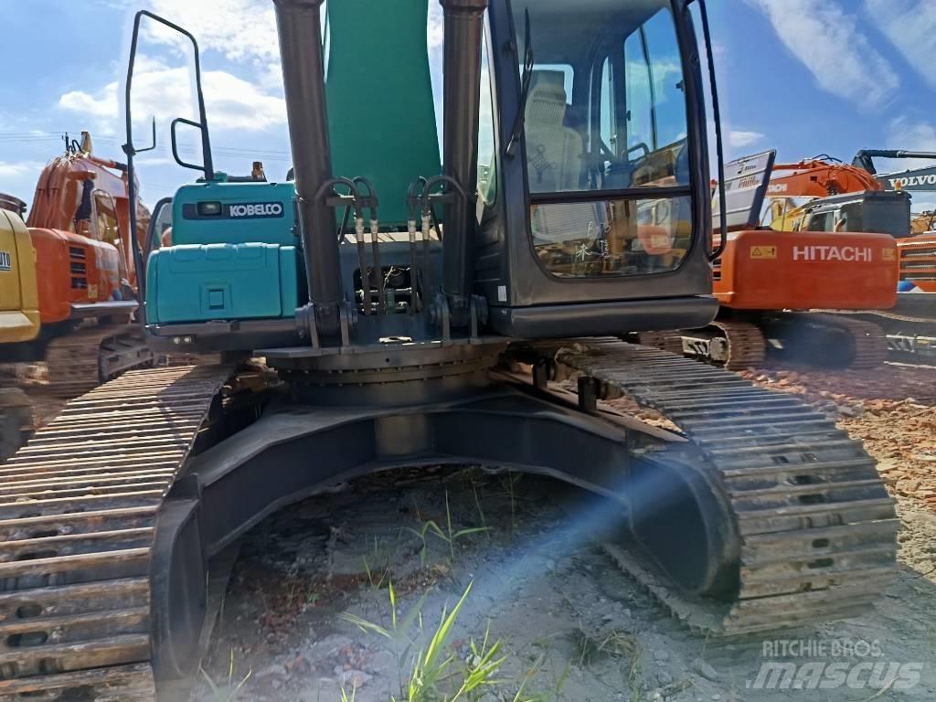 Kobelco SK210 حفارات زحافة