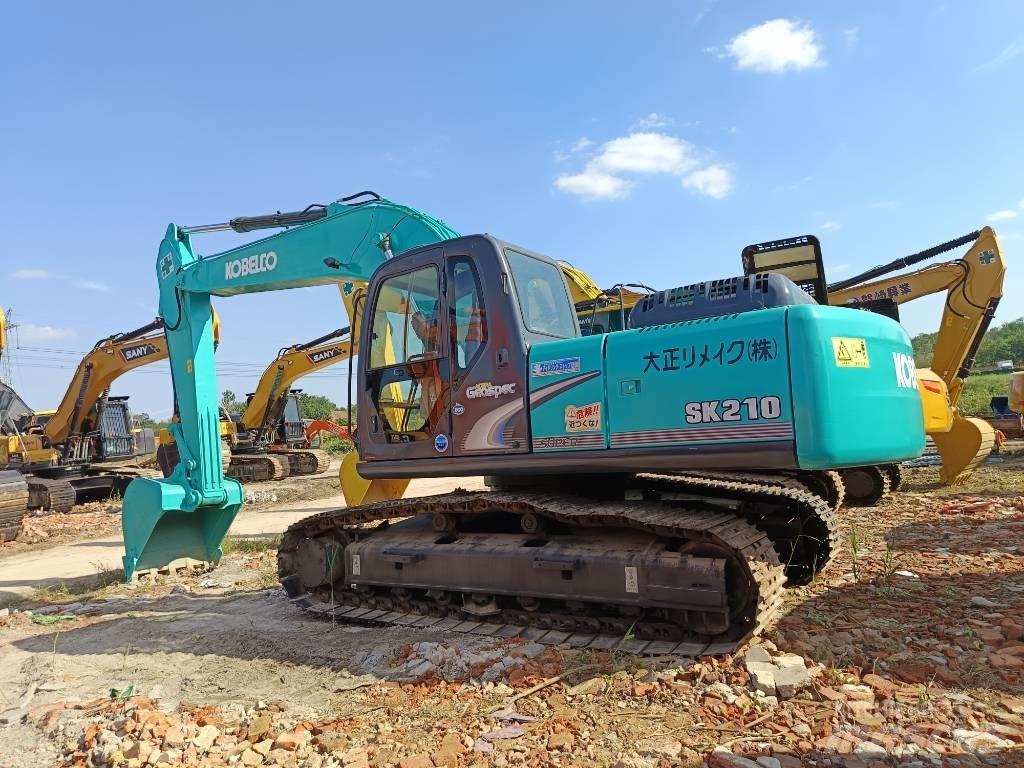 Kobelco SK210 حفارات زحافة