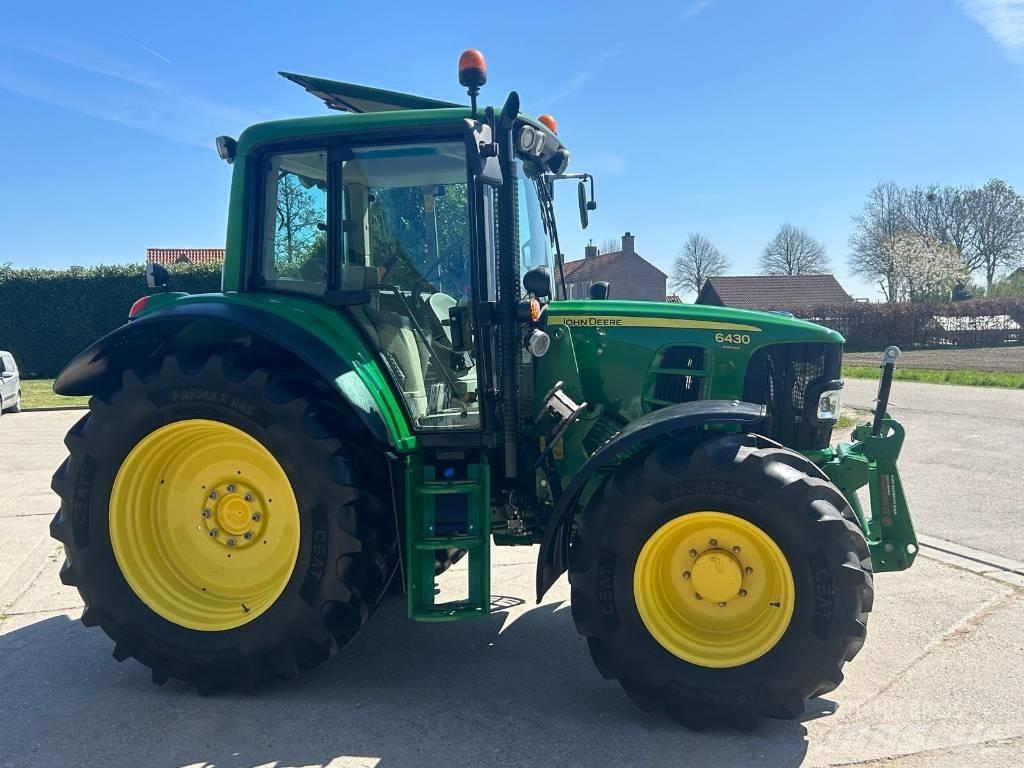 John Deere 6430 الجرارات